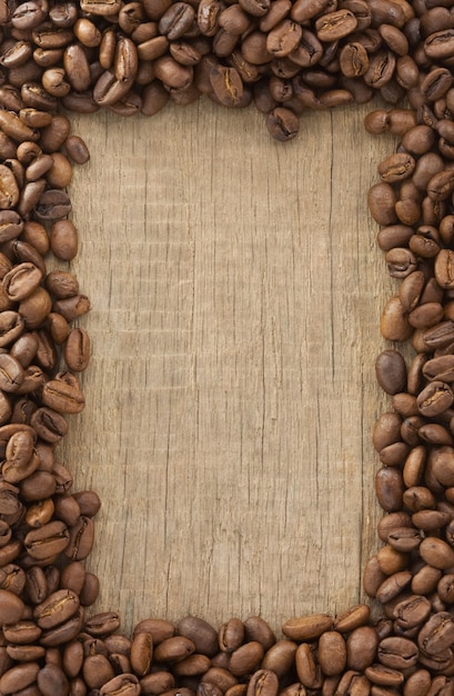 Ziarna kawy na tekstury tła drewna