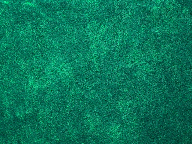 Zielona aksamitna tekstura tkaniny używana jako tło Puste zielone tło tkaniny z miękkiego i gładkiego materiału tekstylnego Jest miejsce na textx9