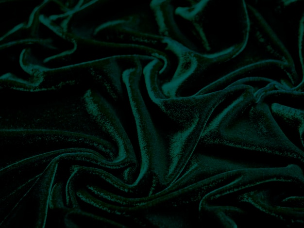 Zielona aksamitna tekstura tkaniny używana jako tło Puste zielone tło tkaniny z miękkiego i gładkiego materiału tekstylnego Jest miejsce na textx9