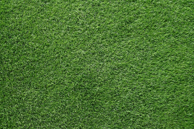 Zdjęcie zielona trawa na tle sztuczna trawa na boisku piłkarskim