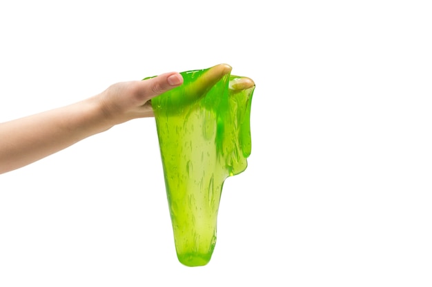 Zielona zabawka szlam w dłoni