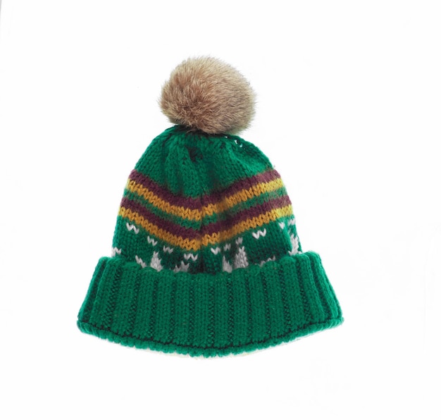 Zdjęcie zielona zimowa wełniana czapka odizolowywająca na białym tle