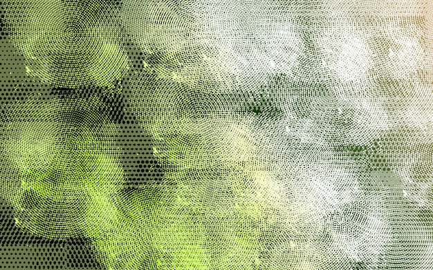 Zdjęcie zielone tło z siatką białych i zielonych kropek.
