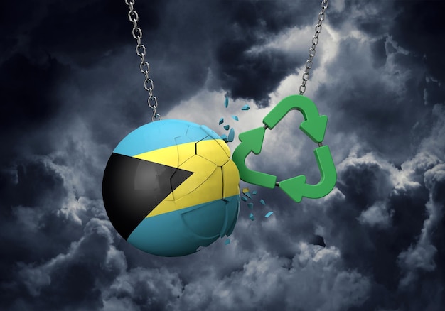 Zielony symbol recyklingu rozbijający się o renderowanie kuli d flagi Bahamów