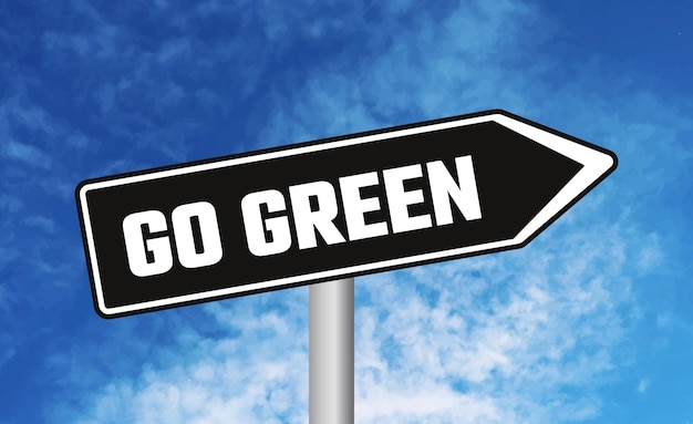Zdjęcie zielony znak drogowy na niebieskim tle