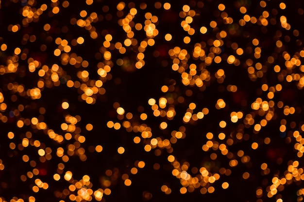 Złote koła bokeh na czarnym tle Boże Narodzenie kolorowe światła Nakładka