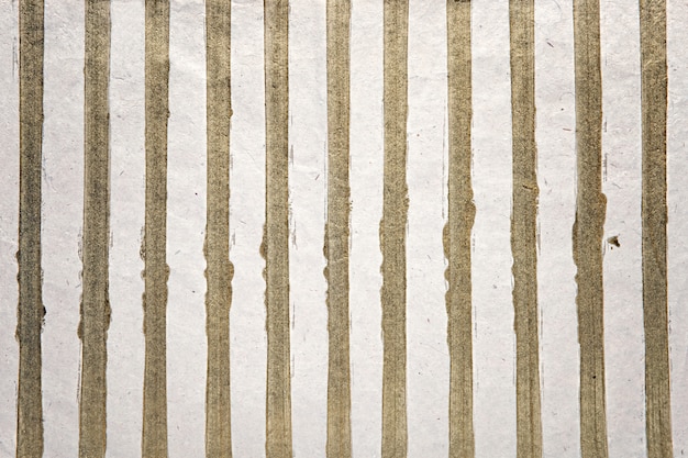 Zdjęcie złote paski na białej powierzchni