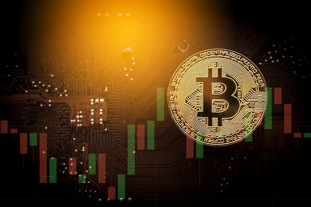 Złoty bitcoin na płycie głównej komputera z wykresem handlowym Koncepcja wydobycia i handlu bitcoinami