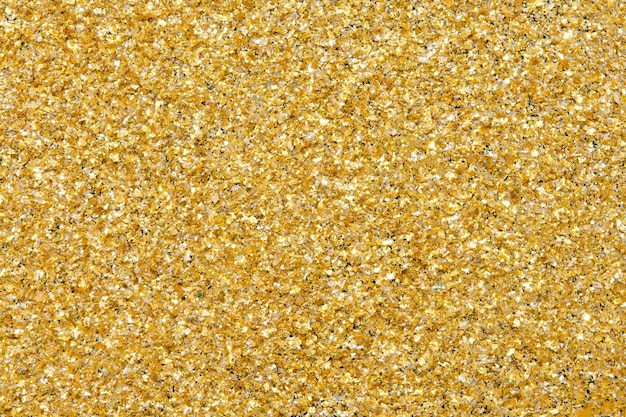 Złoty brokat tekstury blasku tła