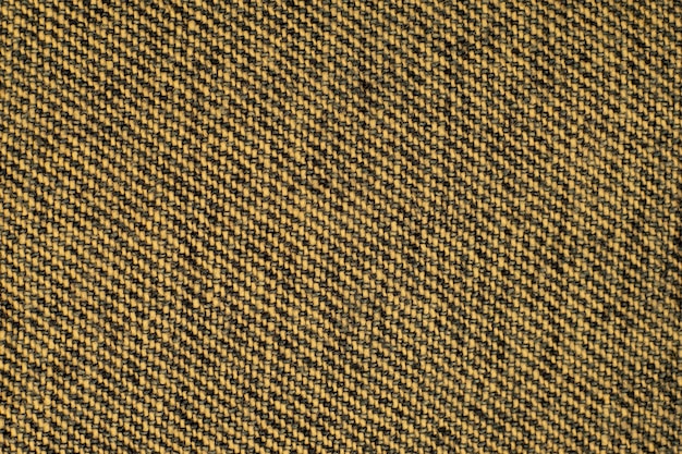 Złoty tkany wzór tekstura tło zbliżenie wiejskie naturalne