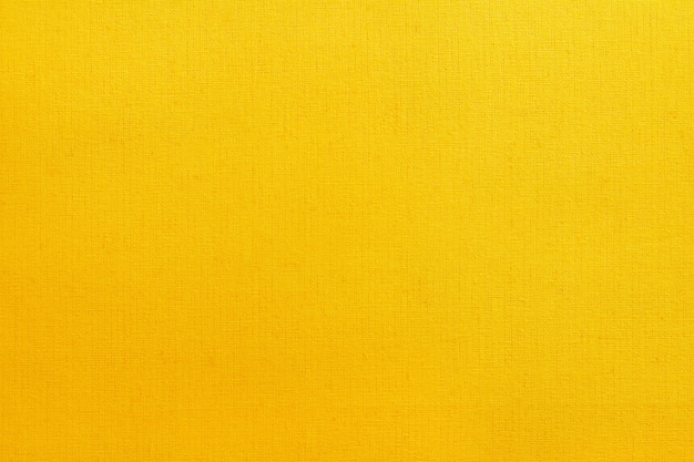 Złoty żółty bawełnianej tkaniny tekstury tło