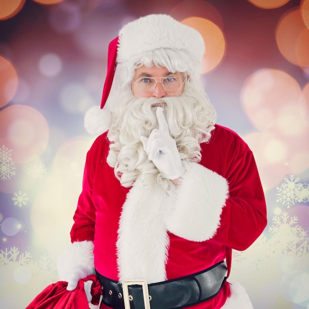 Złożony obraz Świętego Mikołaja trzymającego swój worek i trzymającego tajemnicę