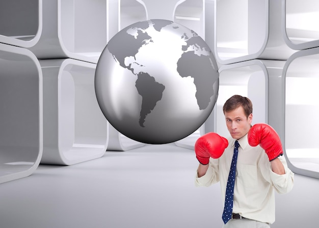 Zdjęcie złożony wizerunek biznesmen z jego bokserskimi rękawiczkami przygotowywającymi walczyć
