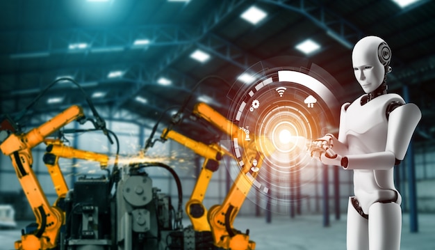 Zdjęcie zmechanizowany robot przemysłowy i ramiona robotów do montażu w produkcji fabrycznej.