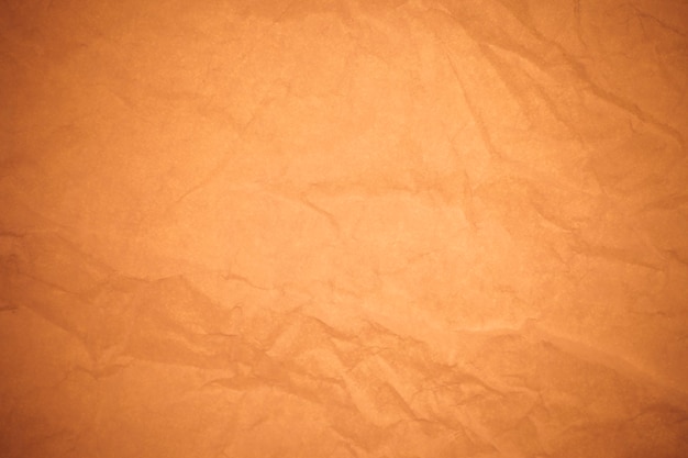 Zmięty papier brązowy tło.