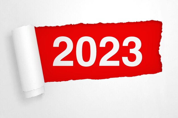 Znak nowego roku 2023 w dziurze rozdartej białej księgi renderowania 3d