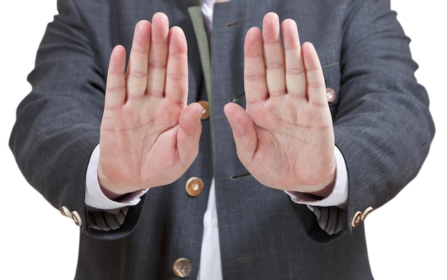 Zdjęcie znak stopu przez dwie dłonie gest dłoni biznesmena