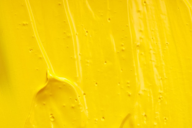 Żółta farba olejna. tło dla projektanta