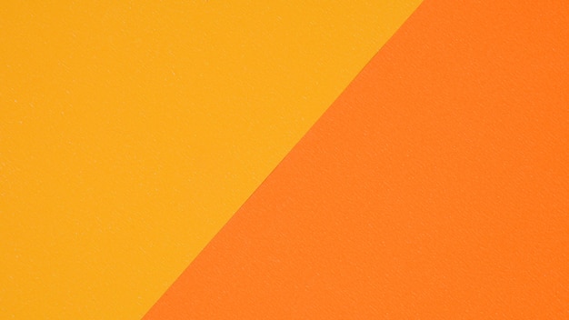 Żółta i pomarańczowa papierowa tekstura dla tła