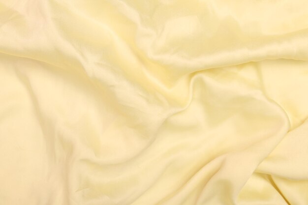 Żółta tekstura abstrakcyjnej tkaniny do tła