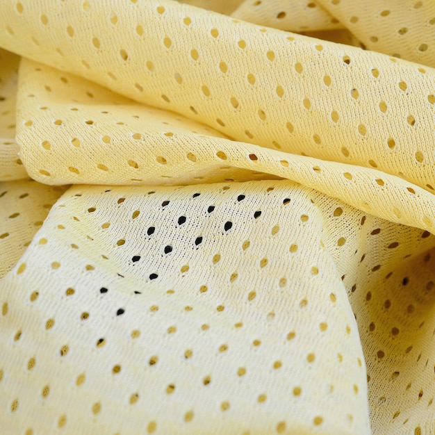 Żółtego siatka sporta odzieży tkaniny tła tekstylny wzór