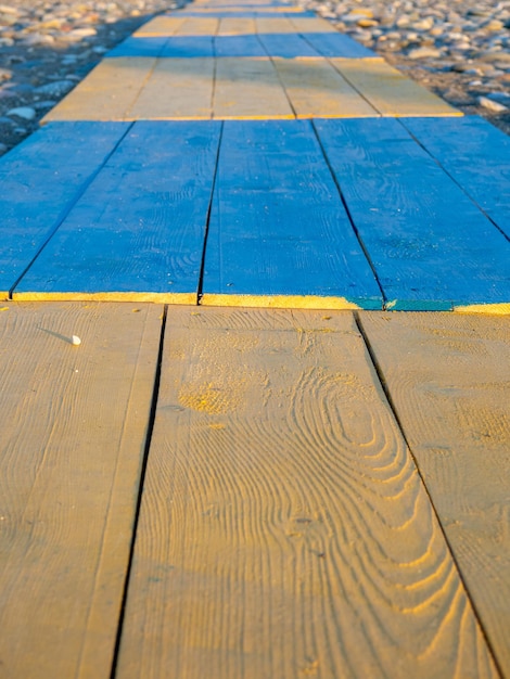 Żółto-niebieska podłoga Promenada na plażę Kolorowe życie