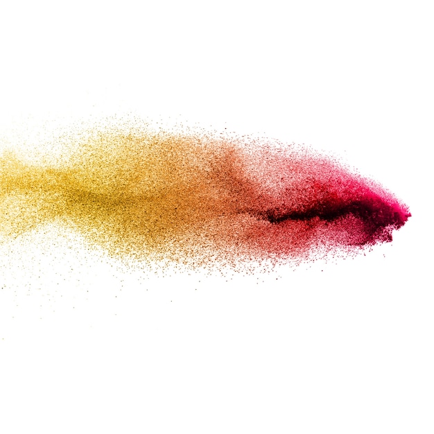 Zdjęcie Żółty czerwony cząsteczka wybuch na białym tle. kolorowy pył splatter na białym backgr