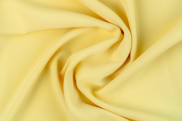 Zdjęcie Żółty kolor tkaniny tkaniny poliestrowej tekstury i tła tekstylnego