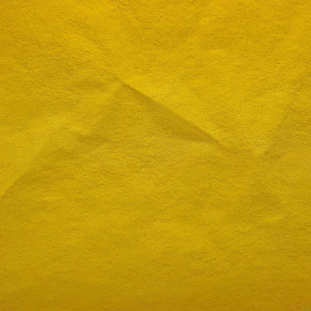 Żółty papier teksturowanej tło