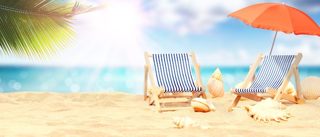 Zrelaksuj się na tropikalnej plaży w słońcu na leżakach pod parasolem.