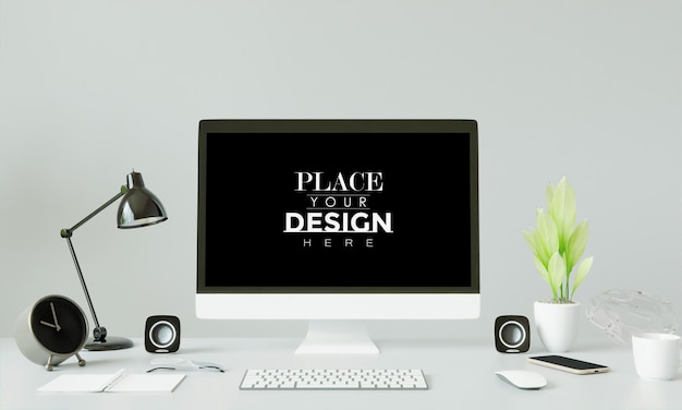 Computer on table in workspace mockup