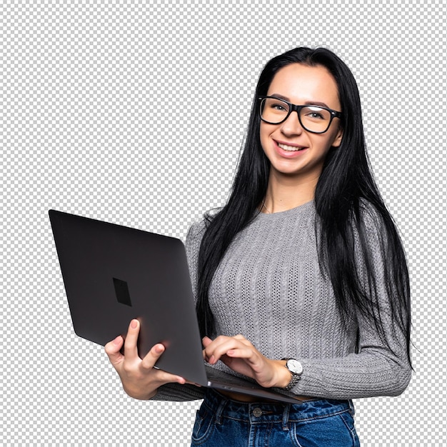 Young happy smiling woman in casual clothes holding laptop isolated on gray wall