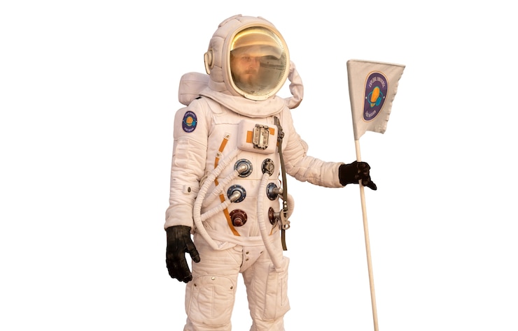 PSD Gratis astronaut mengenakan pakaian luar angkasa