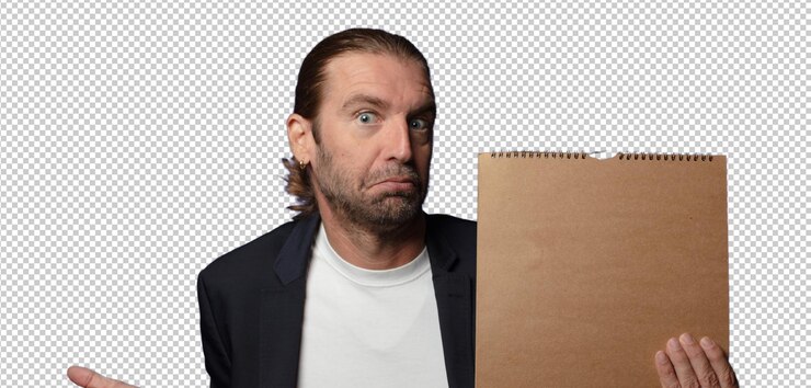 Gratis PSD blonde man met een lege notebook deksel