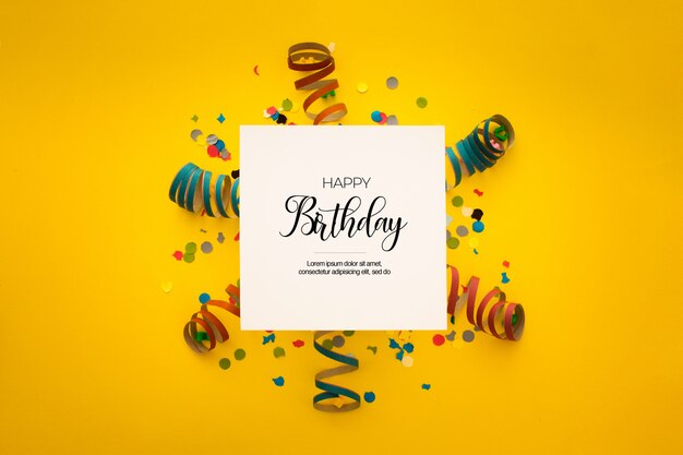Bonita composición de cumpleaños con confeti en amarillo