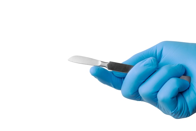 Gratis PSD chirurgisch scalpel met de hand vastgehouden met handschoen