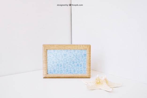 Decoratieve foto frame mockup met zeester