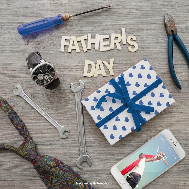 Father&#39;s day lettering, smartphone, cadeau doos en gereedschap