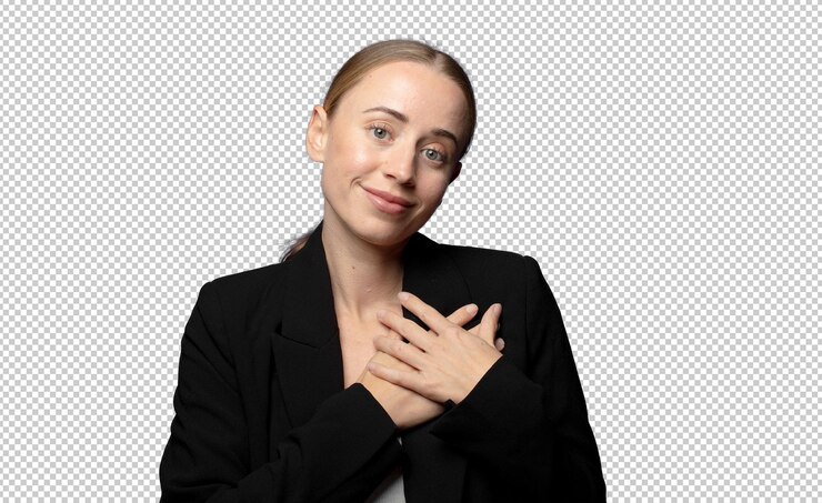 PSD Gratis feeling romantic happy and in love smiling cheerfully and holding hands close to heart