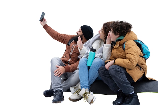 Fotografía completa de la familia tomando una selfie