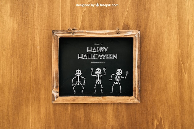 Gratis PSD halloween mockup met houten leisteen