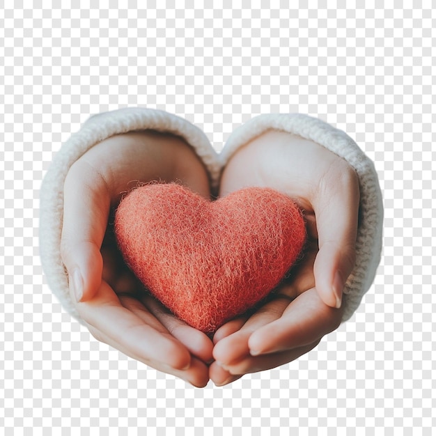 Hartelijke Zorg Een paar handen wiegen zachtjes een warm koraalkleurig vilthart dat liefde, mededogen en warmte symboliseert