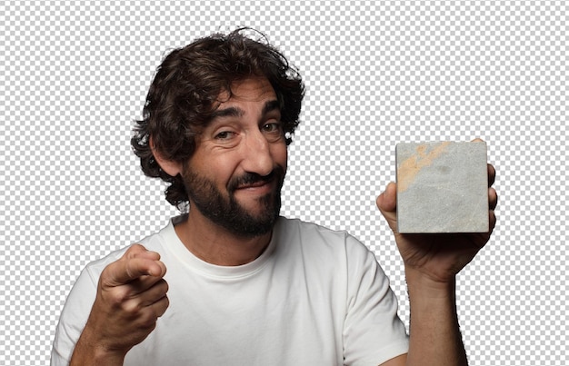 joven adulto barbudo con un ladrillo de piedra