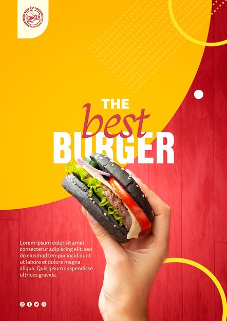Mano che tiene il modello di hamburger panino nero