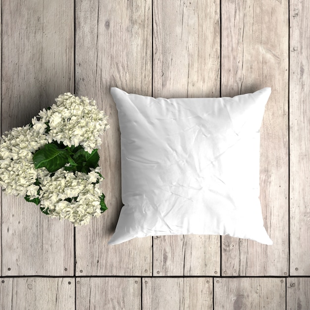 PSD gratuito maqueta de funda de almohada blanca sobre una tabla de madera con decoración floral