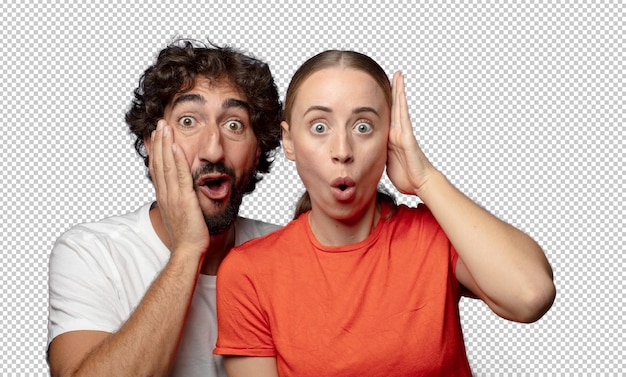 mirando emocionado y sorprendido boca abierta con ambas manos en la cabeza sintiéndose como un ganador afortunado