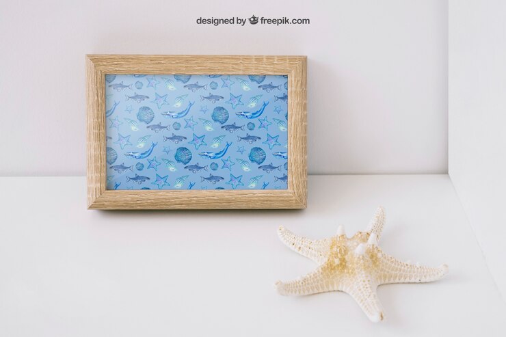 PSD gratuito mockup de marco de foto con estrella de mar