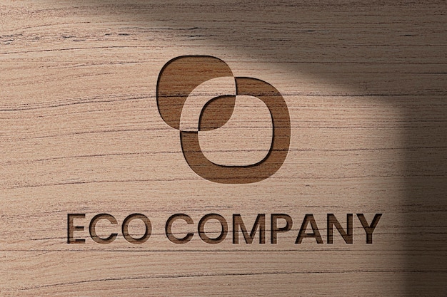 Plantilla de logotipo de empresa ecológica psd en estilo de madera grabada PSD gratuito