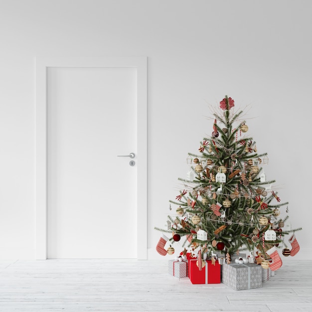 Árbol de Navidad descaorado y regalos junto a una puerta