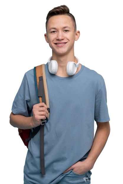 Retrato de estudio de un joven estudiante adolescente con auriculares
